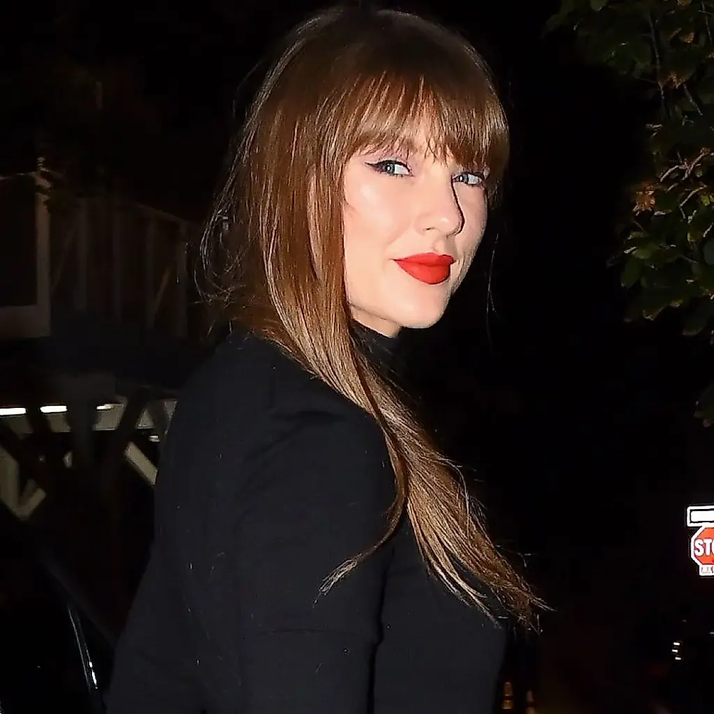 Taylor Swift Sings 'Love Story' at Tight End University in Custom Monse LBD