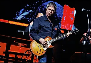 Награда для Галлахера и призрачное примирение Oasis
