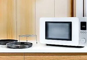 Smeg смешал микроволновку и аэрогриль