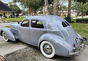 Автомобильный Звезда: Cord 810 Westchester 1936 года