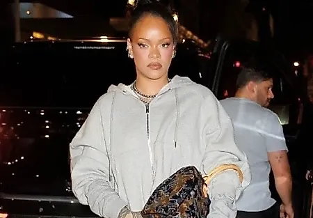 Rihanna Dresses Up Her Sweats With a Sold-Out Louis Vuitton Sequin Bag and Crystal-Covered Gucci Pumps